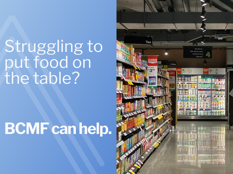 Image of grocery store isle with blue rectangle announcing the BCMF food security program.